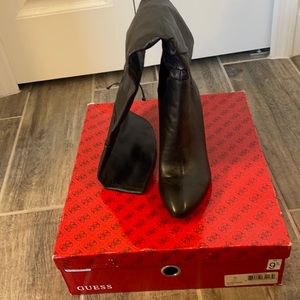 A black soft leather over the knee boot